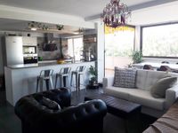 Living room with Kitchen